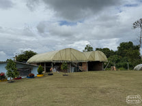 Covered patios built on top of a home for drying coffee and other produce