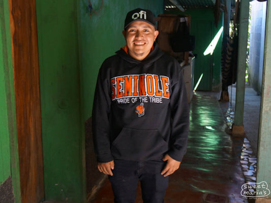 Coffee farmer Silvestre Velasquez poses for a photo at his home in Huehuetenango.