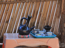 A black clay jabena used to brew coffee at the Chelchele site.